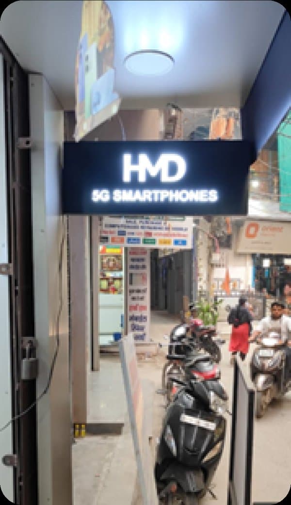 Facade branding and ACP signage for dealership